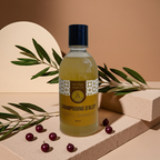 Naturligt Aleppo shampoo i glasflaska på natursten med olivkvistar och laurbär.